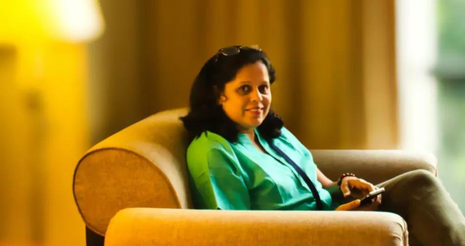 A woman sitting in a chair