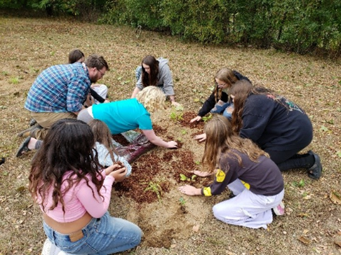 Students working in a garden
