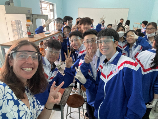 A teacher with students in a classroom