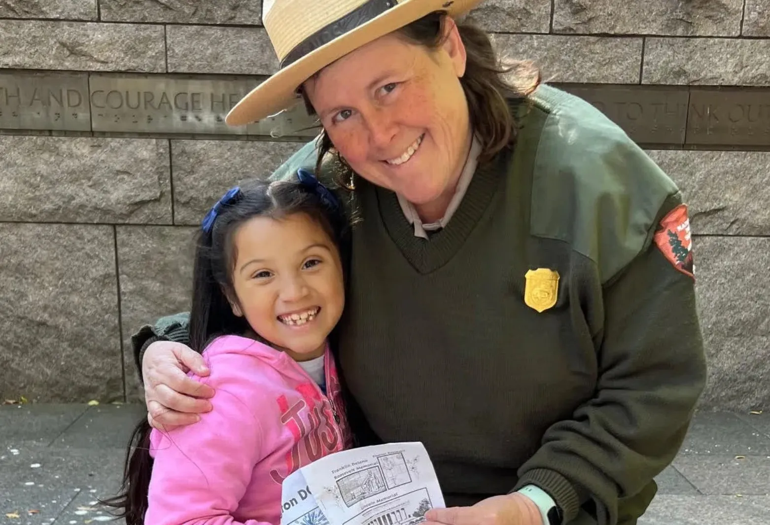 National Park Service Ranger Jennifer Epstein ("Ranger Jen") poses with a student.